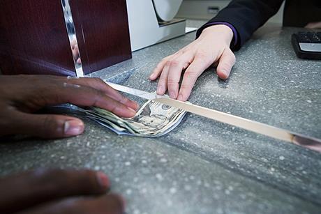 Photo of people working in a bank.