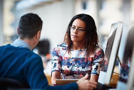 Photo of two people speaking in an exam context. If too complicatd, photo of  speech bubbles to suggest the idea of speaking.