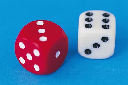 Photo of dice or a board game.