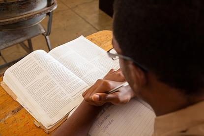 Photo of students reading.