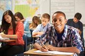 Photo of a class with students from different ethnic communities. Could be a photo of a classroom from South London, for example. If too hard, then a photo of a list of different languages.