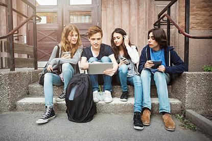 Photo of students doing an activity together, spoken or written.