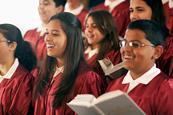 Photo of teenage students singing a song. If too hard, photo of a CD player, or just CDs,  and books to suggest the idea of learning through music.