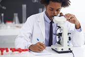 Photo of scientists working in a lab or of instruments used by scientists.