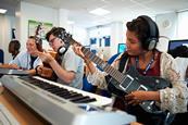 Photo of students practising something together or doing an activity together.