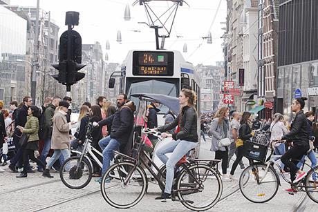 Photo of a bus, a bike, a car ideally all in the same frame, to illustrate the concept of transport.