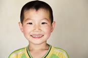 Asian boy smiling