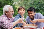 Grandfather, father, and son spending time together.