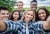 Teenagers smiling for selfie